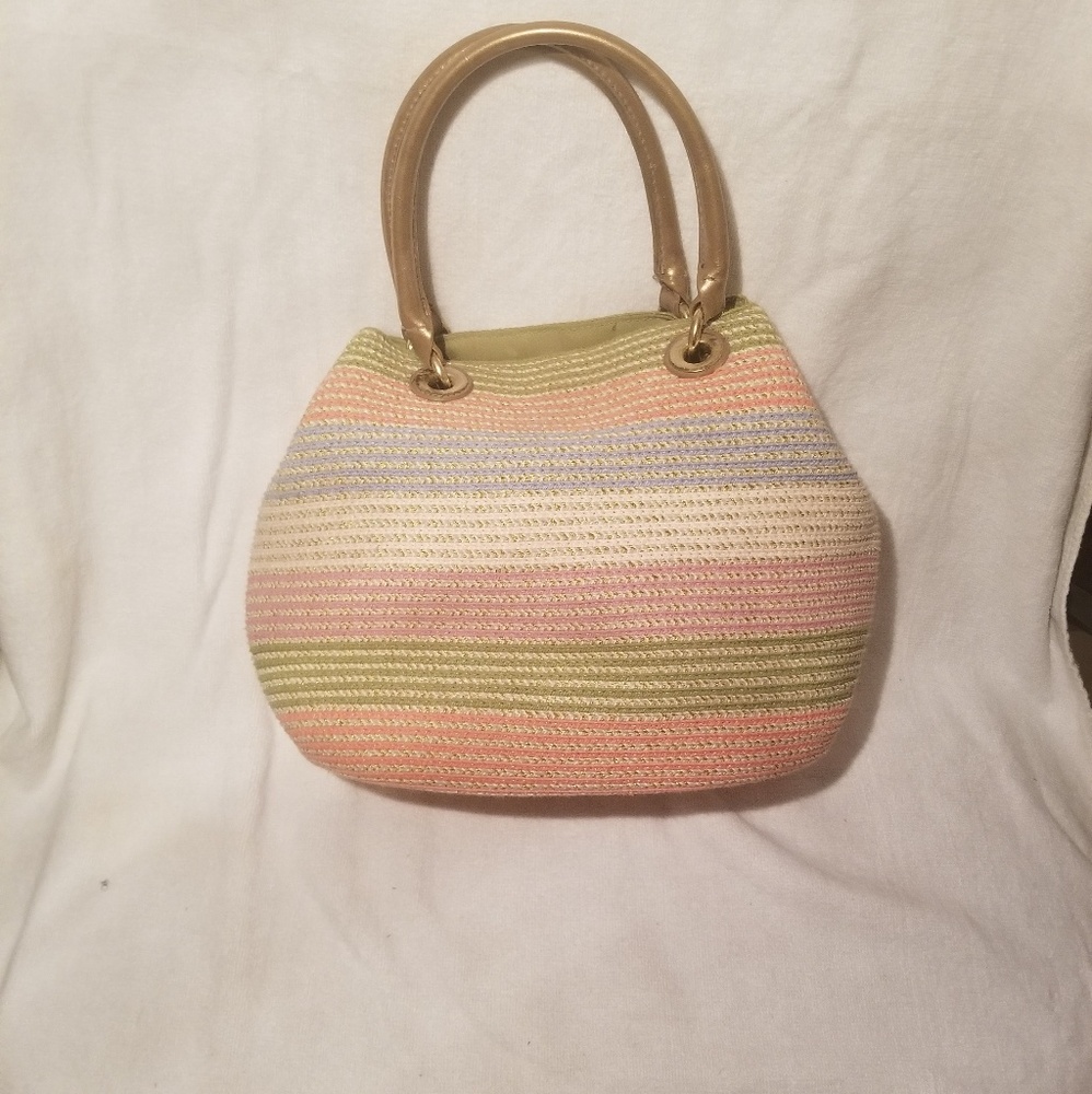 Small handbag with gold handles and gold strap